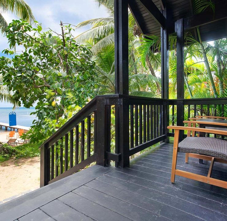 Beachfront Suite Patio in Roatan at Puerta Azul Boutique Hotel
